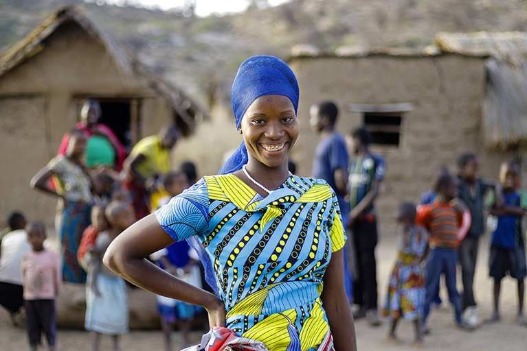 After growing up illiterate, Oliva from Tanzania attended an Adults Learning Program run by Caritas Australia partner DMDD. She can now read, write and count and this has enabled her to run her small kiosk and restaurant more efficiently without people taking advantage of her. She now feels closer to her children after being able to help them with their homework. To give back to her community, she teaches other adults at her home who are too shy to go to the same school as their children. She motivates them and they hope to be like her one day. Photo credit: Richard Wainwright/Caritas Australia.